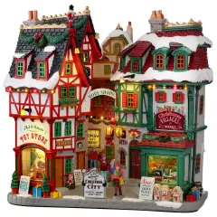 Lemax Christmas City 15739 – Facciata Natalizia Luminosa con Negozi di Giocattoli